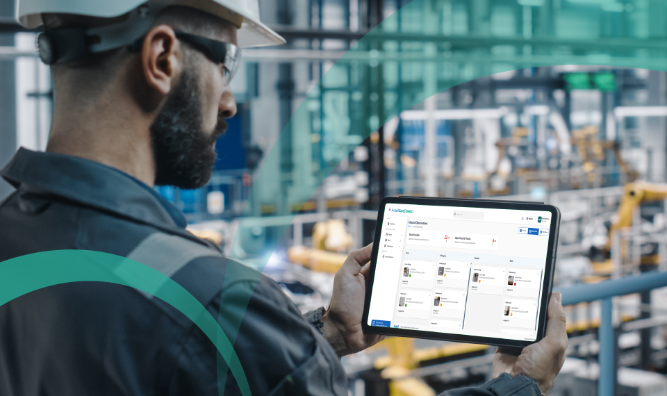 Image of safety manager interacting with Ansell safety app and checking for safety insights to streamline safety processes