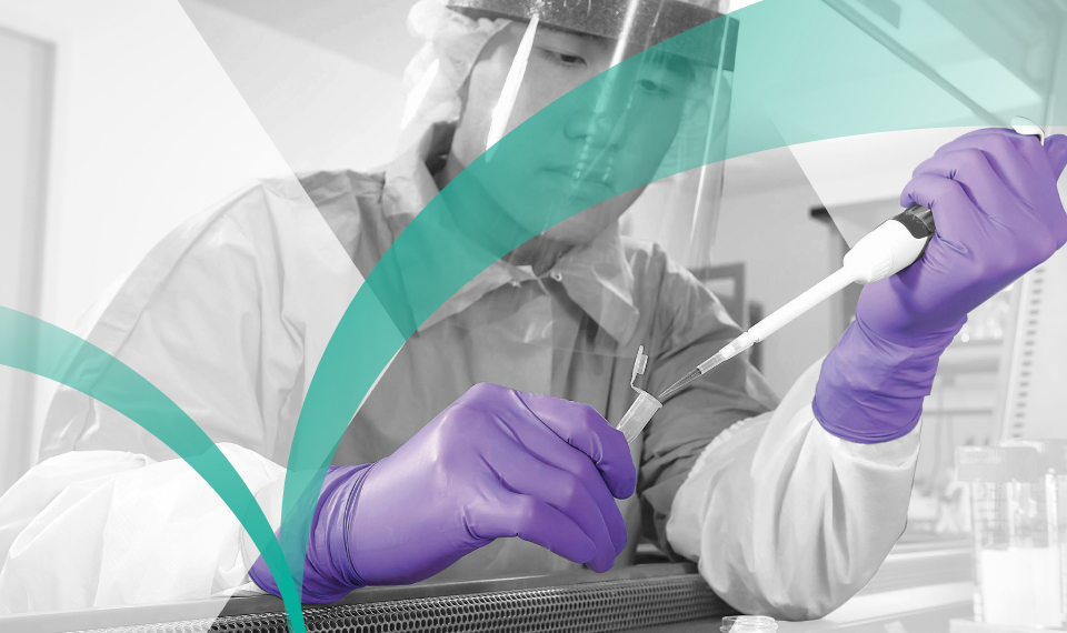 Workers using Kimtech™ personal protective equipment in a cleanroom environment, supported by The Apex™ Program.