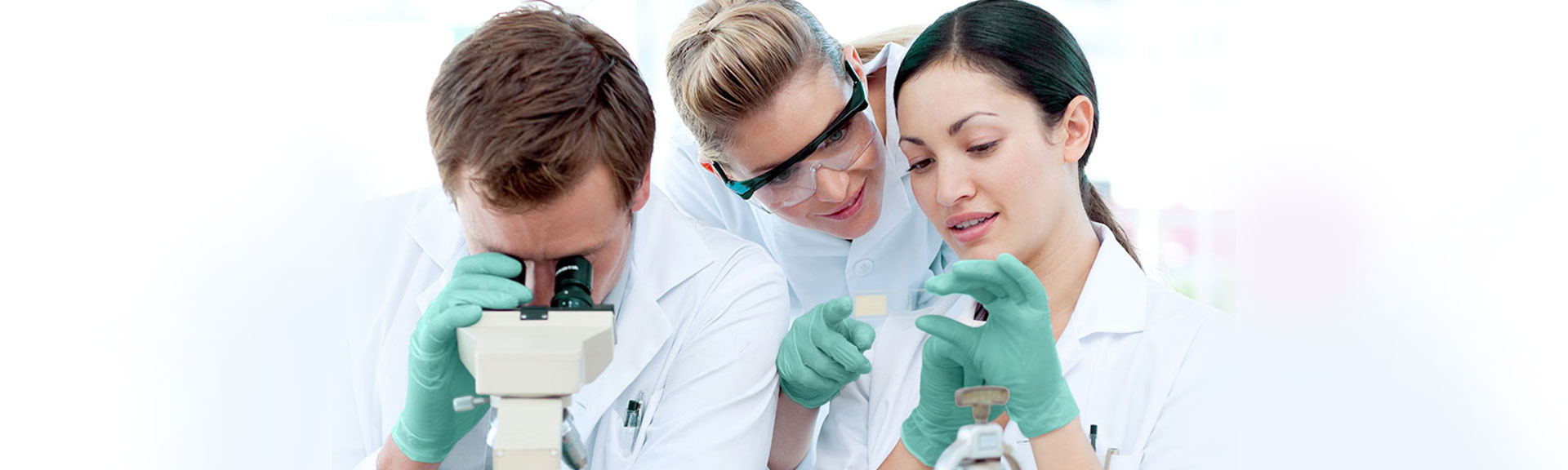 Scientist working with latex-free neoprene gloves.
