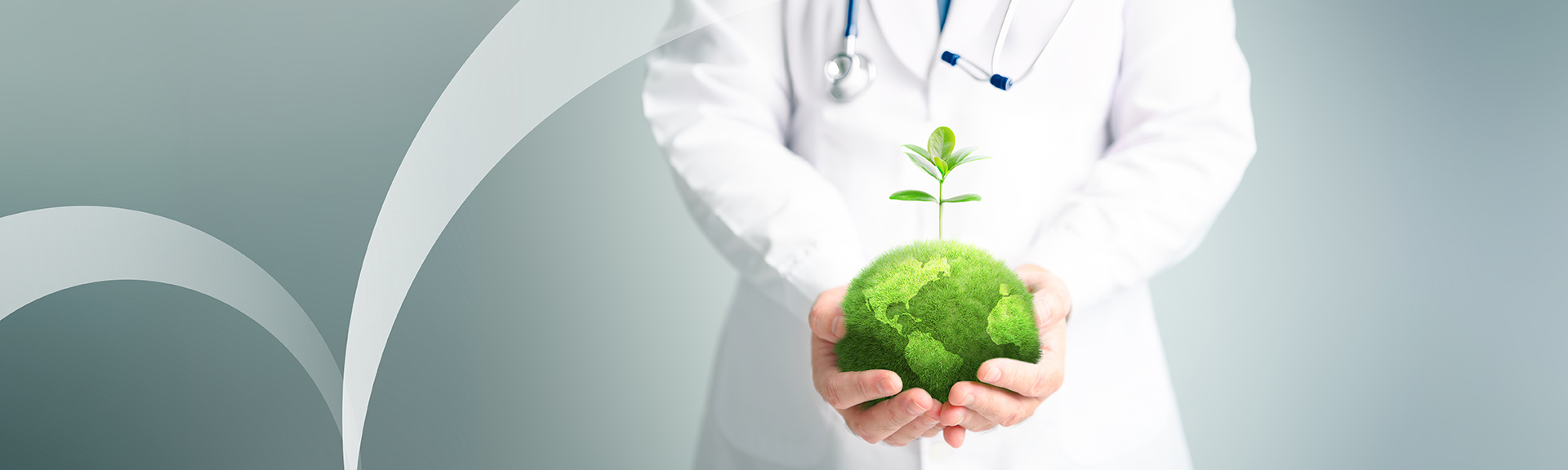 Hospital worker holding green Earth on grey background