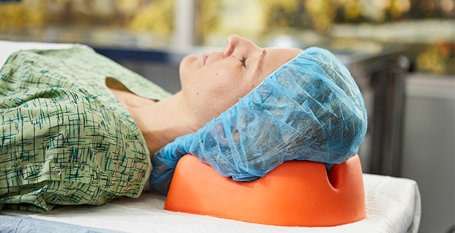 Patient laying on positioner