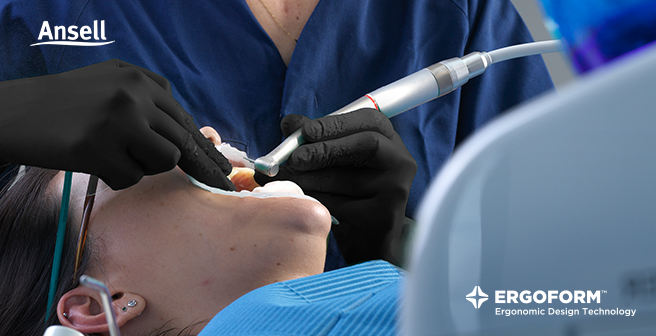 A dentist using MICROFLEX Midknight Black 92-732 gloves with Ergoform technology on their patient.