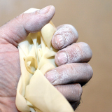 Promoting safety by raising awareness of glove powder hazards