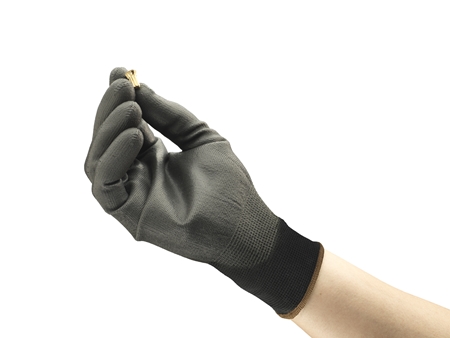 Hand wearing HyFlex 48-101 glove, holding a mechanical component